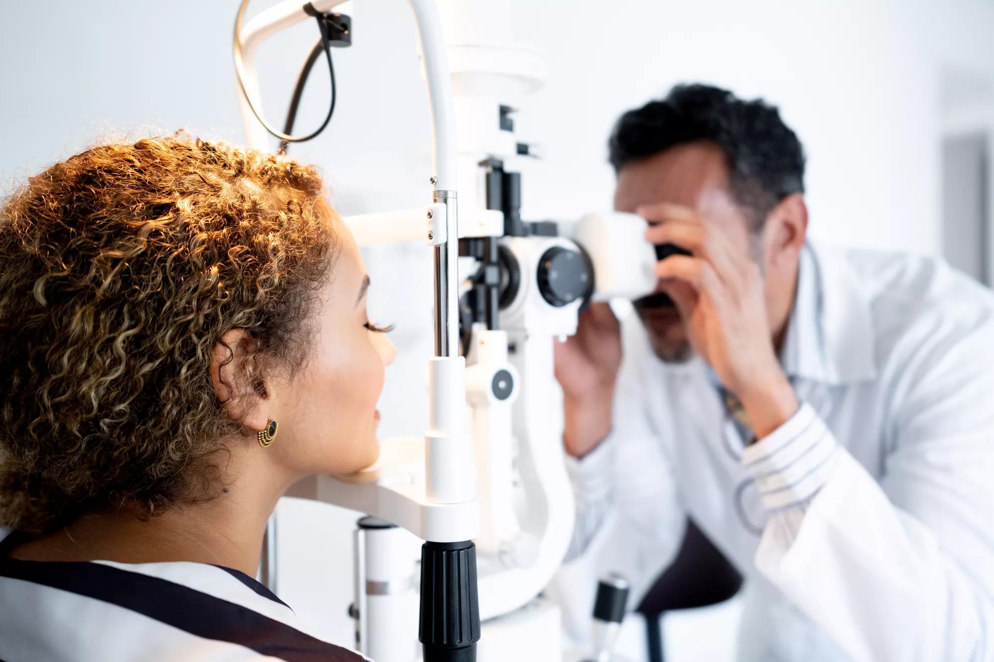 Dr conducting an eye exam