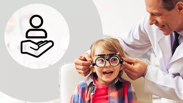 Kid with eye specialist getting eye exam