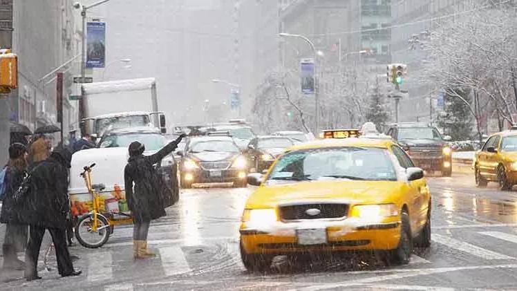 A rainy and busy day in the city.