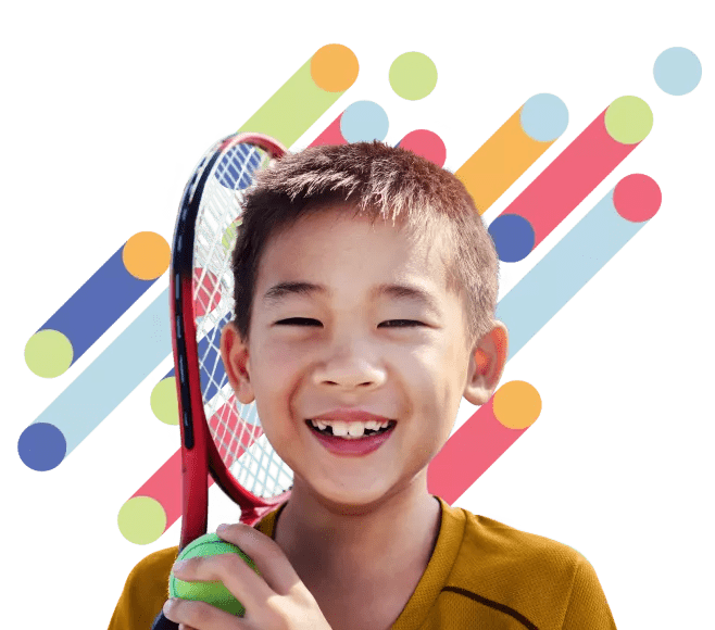 Child with tennis racquet and ball