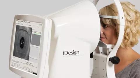 Female patient getting eye exam using iDESIGN