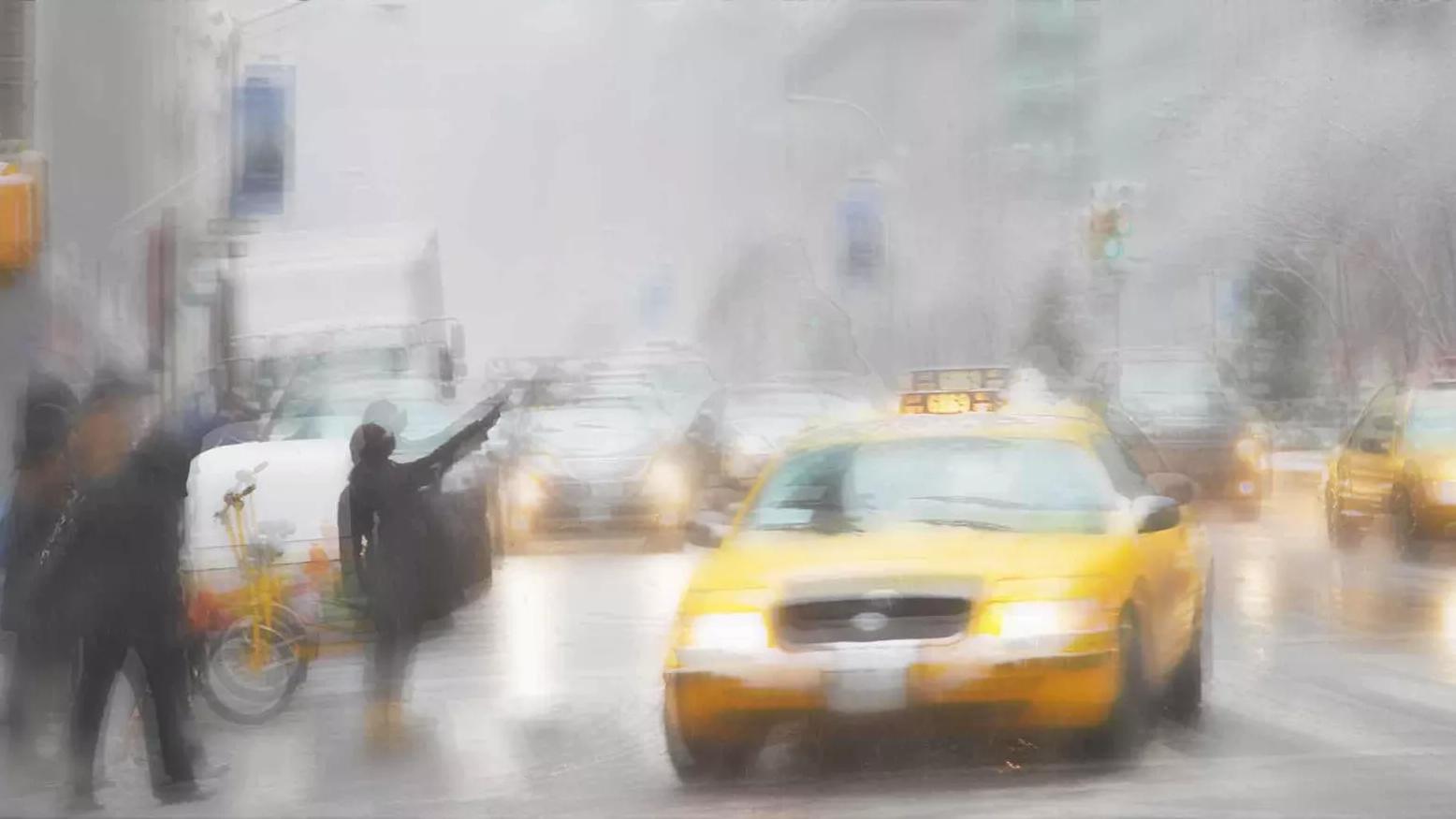 A rainy and busy day in the city blurred to simulate vision with fogged over glasses lenses.