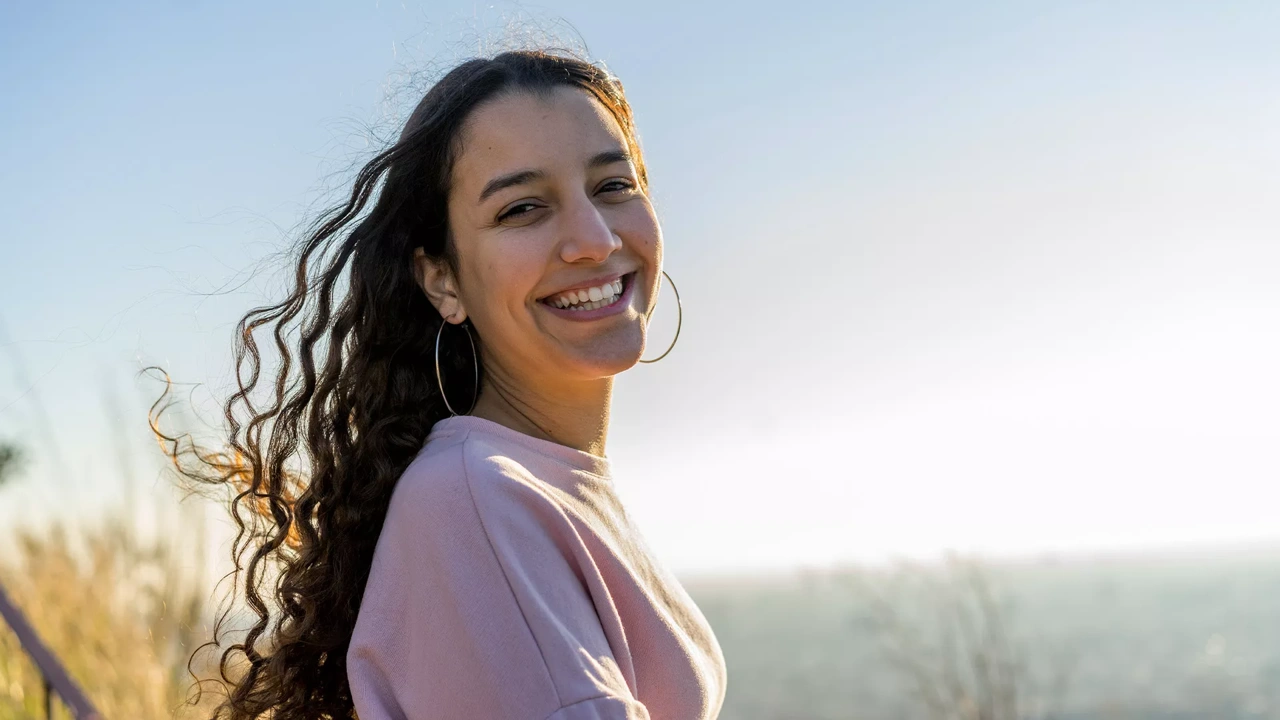 Woman looking at camera smiling