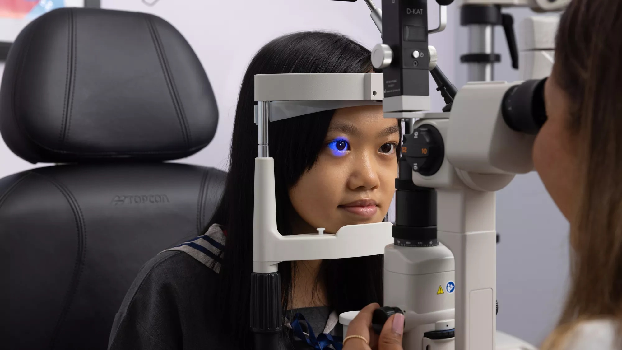 Girl getting an eye check